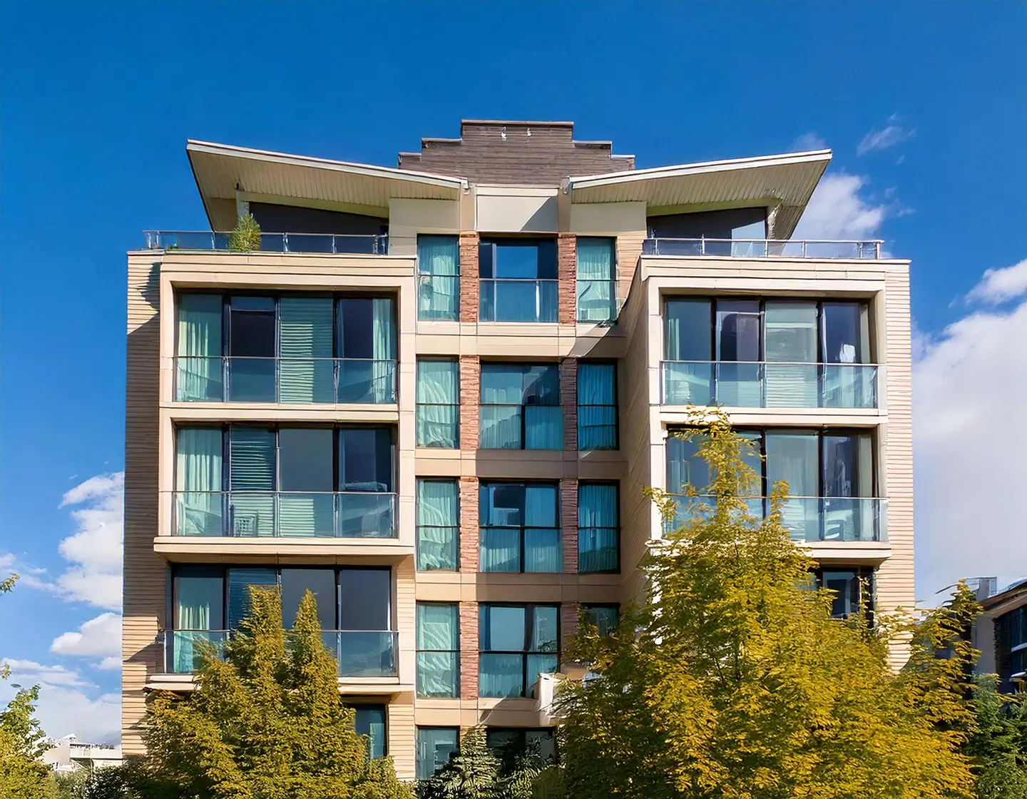 Firefly a modern condominium building in canada with a blue sky in the background, few bushes or tre